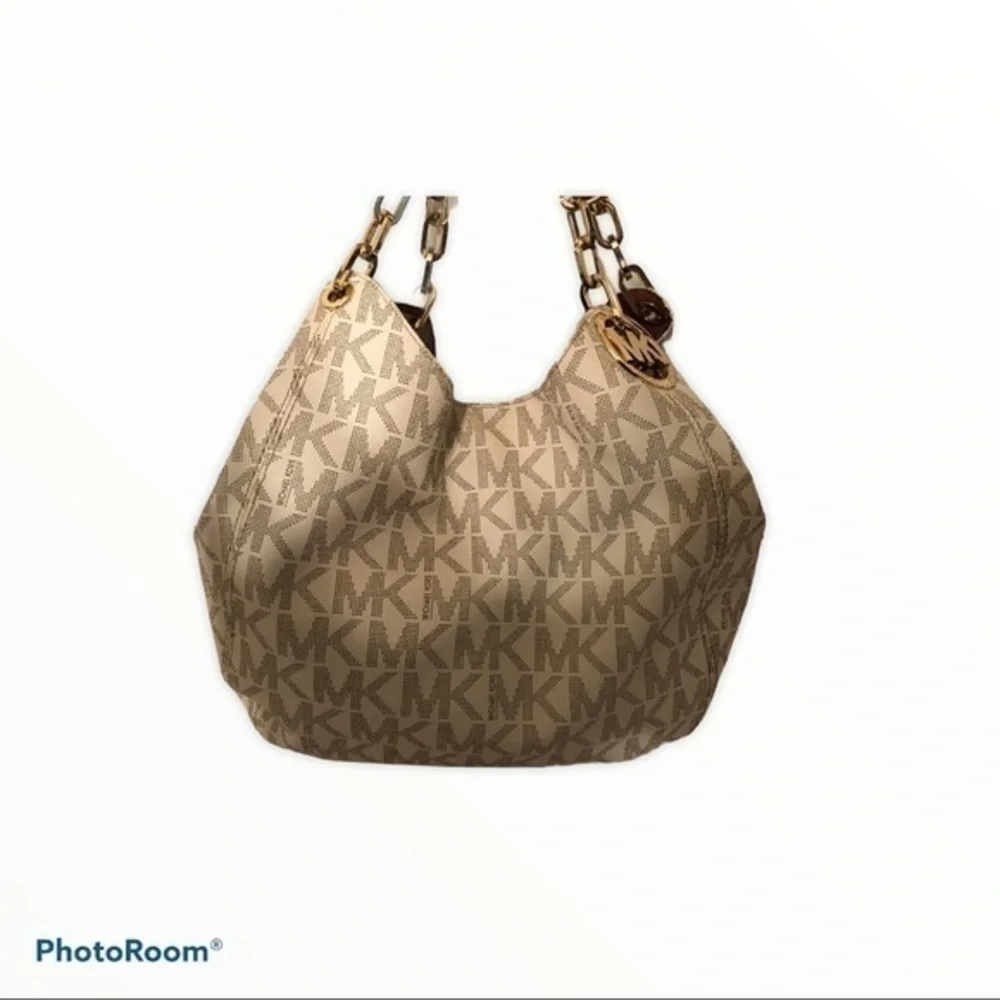 Michael kors white monogram triple compartment bag